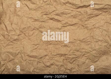 Crafted recycled paper with texture and wrinkled effect. Crumpled paper backing. High quality photo Stock Photo