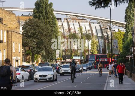 Vauxhall London street scene - people and cars on Harleyford Rd, leading from the station to the Oval cricket ground, Vauxhall, Lambeth, London UK Stock Photo