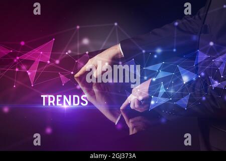 Businessman touching huge screen concept Stock Photo