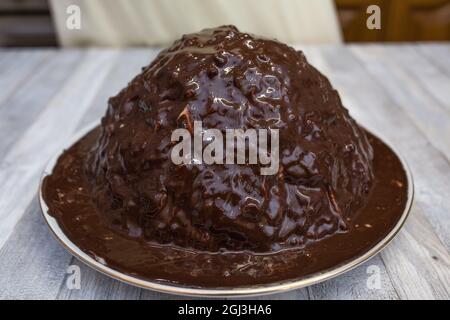 Cake making process. Chocolate cake with sour cream is ready. Step by step recipe for chocolate cake. Series. Baking concept. Stock Photo