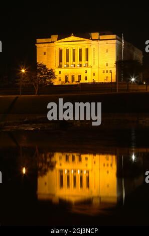 Dayton Masonic Center at night with reflections from the Miami River. Dayton, Ohio, USA. Stock Photo