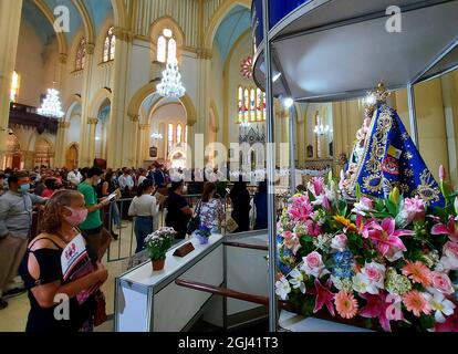 Santos, Sao Paulo, Brasil. 8th Sep, 2021. (INT) Homage to Our Lady of Monte Serrat, patron saint of Santos. September 8, 2021, Santos, Sao Paulo, Brazil: Faithful follow the trajectory of the image of Our Lady of Monte Serrat, patron saint of the city of Santos, which leaves the cathedral and returns to the top of Monte Serrat, on the coast of Sao Paulo, on Wednesday (8), a municipal holiday. (Credit Image: © Luigi Bongiovanni/TheNEWS2 via ZUMA Press Wire) Stock Photo