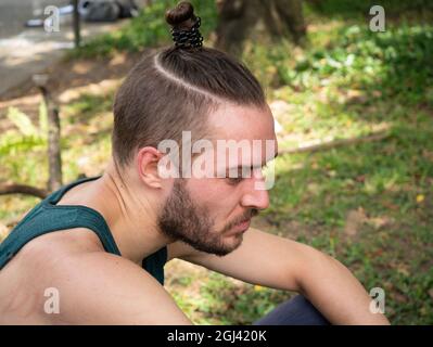 Portrait of Disappointed and Angry White Man on a Sunny Day in Medellin, Colombia Stock Photo