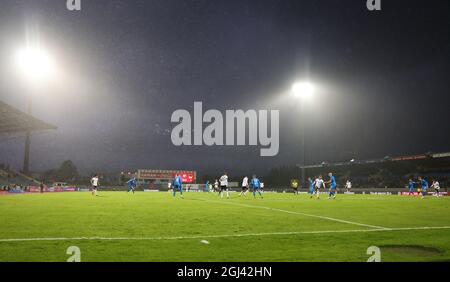 Reykjavik, Iceland. 08th Sep, 2021. Football: World Cup qualifying, Iceland - Germany, Group stage, Group J, Matchday 6 at Laugardalsvöllur stadium. The teams are on the pitch in the rain. Credit: Christian Charisius/dpa/Alamy Live News Stock Photo