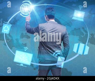 The businessman pressing buttons in computing concept Stock Photo