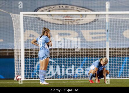 Manchester, England, 8th September 2021.  Georgia Stanway and Laura Coombs of Manchester City react after the UEFA Womens Champions League match at the Academy Stadium, Manchester. Picture credit should read: Darren Staples / Sportimage Credit: Sportimage/Alamy Live News Stock Photo