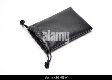 Black synthetic leather pouch for accessories and fashion apparels on the white background Stock Photo