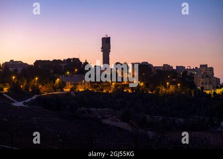 View at twilight of the Hebrew University of Jerusalem, Israel's second-oldest university, established in 1918 situated on Mount Scopus, Jerusalem Israel Stock Photo