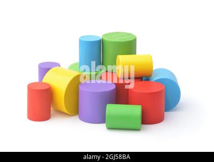 Group of colorful wooden toy cylinders isolated on white Stock Photo