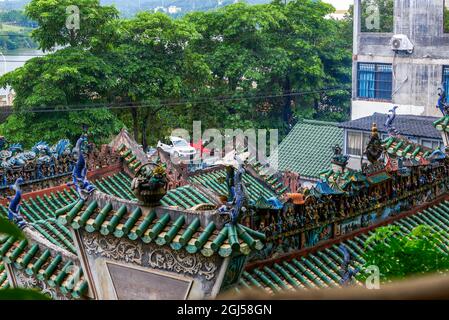 Colorful roofs of ancient Chinese Lingnan-style buildings Stock Photo