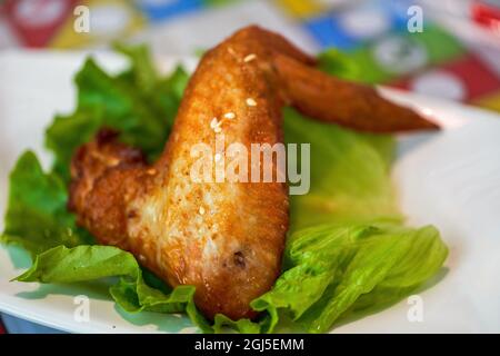 Deep-fried chicken wings in a Hong Kong tea restaurant Stock Photo
