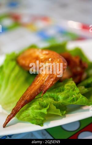 Deep-fried chicken wings in a Hong Kong tea restaurant Stock Photo