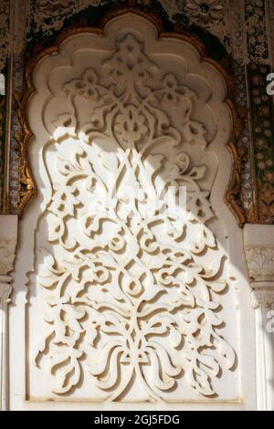 JAIPUR, INDIA - May 29, 2021: Jaipur, Rajasthan, India - February 2012: The beautiful ornate marble inlays carved on the walls of the ancient Amber Pa Stock Photo