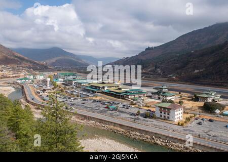 Bhutan, Paro. Paro Valley International Airport. Located in a deep valley at over 10,000 feet, it's rated as one of the most challenging airports in t Stock Photo