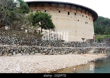 China, Fujian Province, Yongding County, Yongding Tulou. One of the earth buildings that are common in this part of China where many families live. Th Stock Photo