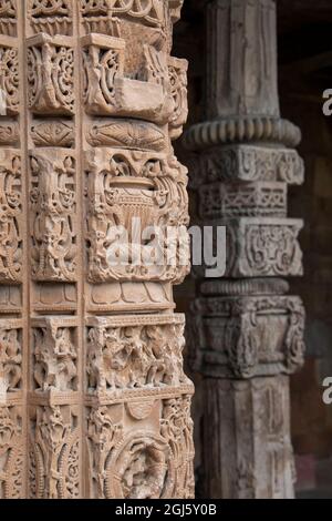 India, Delhi. Qutub Minar, circa 1193, one of earliest known samples of Islamic architecture. Detail of ornate carved sandstone. UNESCO. Stock Photo