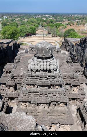 India, Ellora Caves. Overview looking down on the top of Cave 16, The Kailasa Temple, aka Kailasanatha, entirely carved out of one single rock. UNESCO Stock Photo