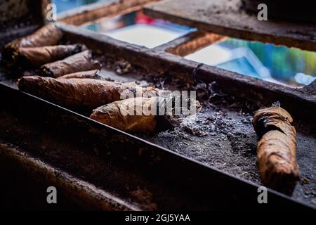 Caracas, Venezuela. 04th Sep, 2021. Tobacco butts used for each patient are  seen at a spiritual center. The Venezuelan population is affected by the  lack of money and uses alternative medicine to