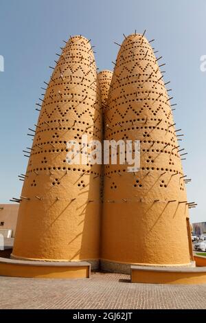 State of Qatar, Doha. Katara Pigeon Towers. Built in 2006-2007 of adobe, clay, bricks and wood. Stock Photo