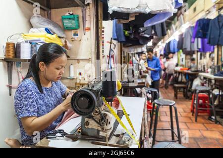 Cambodia, Phnom Penh. Russian Market, tailor. Stock Photo