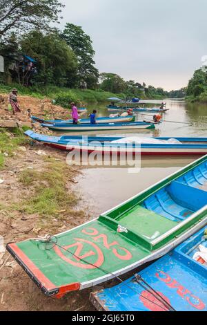 Cambodia, Battambang. Riverboats on the Sangker River. Stock Photo