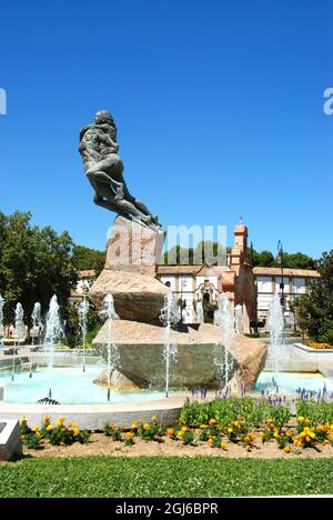 Fountain in the Plaza Castilla with the bullring to the rear, Antequera, Spain. Stock Photo