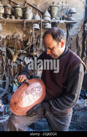 Azerbaijan, Lahic. Metalworker. (MR) Stock Photo