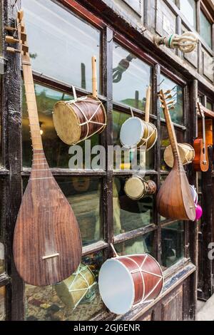 Azerbaijan, Sheki. Traditional instruments outside music shop Stock Photo