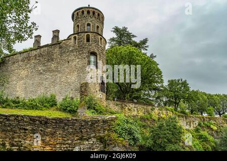 Ruins of the ramparts of the Benedictine priory, perched on a hill, of Crèmieu in France. Crémieu, Auvergne-Rhône-Alpes region, France Stock Photo