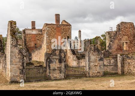 Europe, France, Haute-Vienne, Oradour-sur-Glane. Ruined stone building in the martyr village of Oradour-sur-Glane. (Editorial Use Only) Stock Photo