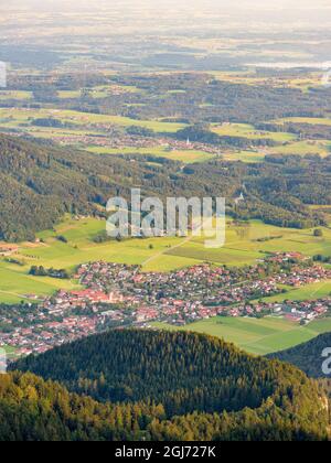 View over the foothills of the Chiemgau Alps and town Aschau in Upper Bavaria. Europe, Germany, Bavaria Stock Photo