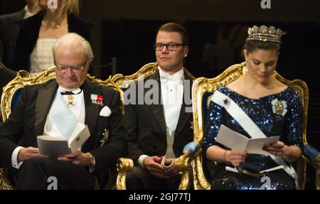 STOCKHOLM - 20111210 King Carl Gustaf, Prince Daniel and Crown Princess Victoria  during the Nobel award ceremony in the Concert Hall of Stockholm Sweden, December 10, 2011  Foto: Henrik Montgomery / SCANPIX Kod: 10060 Stock Photo