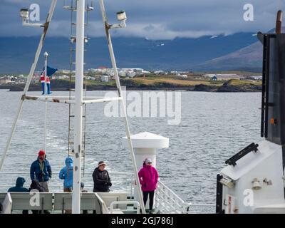 Village Stykkisholmur from the ferry to the Westfjords (Vestfirdir) on peninsula Snaefellsnes in western Iceland. (Editorial Use Only) Stock Photo