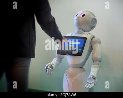 TURIN, ITALY - Feb 12, 2020: The robot Pepper by SoftBank Robotics. First humanoid assistant for better customer experience. Stock Photo