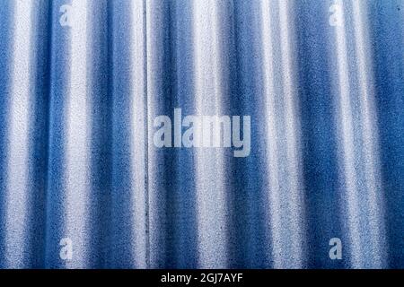 Silver Light blue Corrugated Lead, Metal abstract Patterns Background, Reykjavik, Iceland. Most houses in Iceland are made from corrugated lead metal Stock Photo