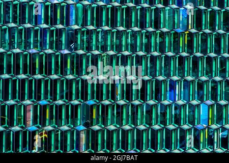 Modern glass abstract background concert hall, Reykjavik, Iceland. Constructed in 2011 of Modern Geometric Shaped glass Panels Stock Photo
