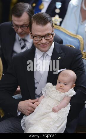 STOCKHOLM 2012-05-22 Prince Daniel and Princess Estelle during the christening ceremony of Princess Estelle of Sweden in the Royal Chapel in Stockholm, Sweden May 22, 2012. Princess Estelle is the daughter of Crown Princess Victoria and Prince Daniel of Sweden. Princess Estelle is number two in the Swedish royal succession Foto: Claudio Bresciani / SCANPIX / Kod 10090 Stock Photo