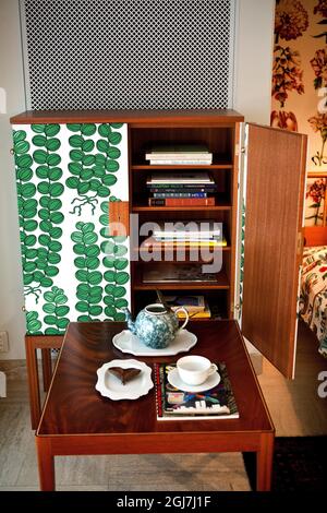 Svenskt Tenn is an interior design shop located on Strandvagen in Stockholm, Sweden. The pictures are taken in connection with the re-opening after a complete renovation in 2011. Seen is a Josef Frank fabric and cabinet. Stock Photo