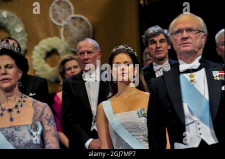 STOCKHOLM 20121210  Queen Silvia, Princess Madeleine and  King Carl Gustaf at the Nobel Prize Award Ceremony at the Stockholm Concert Hall, 10 december, 2012. Foto: Jonas Ekströmer / SCANPIX kod 10030   Stock Photo