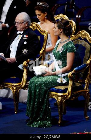 STOCKHOLM 20121210  King Carl Gustaf,  Crown Princess Victoria, Princess Madeleine at the Nobel Prize Award Ceremony at the Stockholm Concert Hall, 10 december, 2012. Photo Henrik Montgomery / SCANPIX kod 10060    Stock Photo