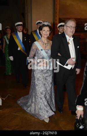 STOCKHOLM 2012-12-10 Queen Silvia and Marcus Storch, Chairman of the Nobel Foundation at the Nobel Banquet in the City Hall in Stockholm Sweden, December 10, 2012. Photo Jessica Gow  / SCANPIX code 10070   Stock Photo