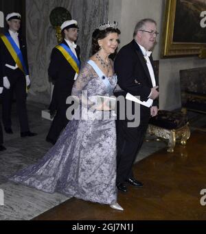 STOCKHOLM 2012-12-10 Queen Silvia and Marcus Storch, Chairman of the Nobel Foundation at the Nobel Banquet in the City Hall in Stockholm Sweden, December 10, 2012. Photo Claudio Bresciani / SCANPIX code 10090   Stock Photo