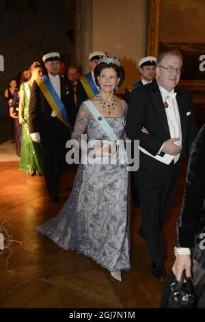 STOCKHOLM 2012-12-10 Queen Silvia and Marcus Storch, Chairman of the Nobel Foundation at the Nobel Banquet in the City Hall in Stockholm Sweden, December 10, 2012. Photo Jessica Gow  / SCANPIX code 10070   Stock Photo