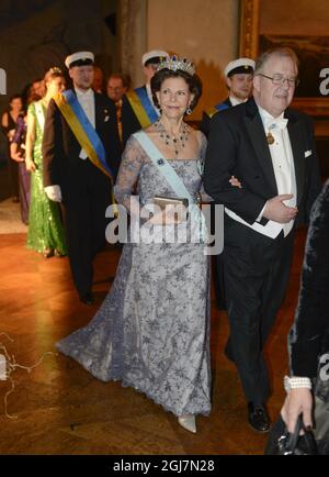 STOCKHOLM 2012-12-10 Queen Silvia and Marcus Storch, Chairman of the Nobel Foundation at the Nobel Banquet in the City Hall in Stockholm Sweden, December 10, 2012. Photo Jessica Gow  / SCANPIX code 10070   Stock Photo