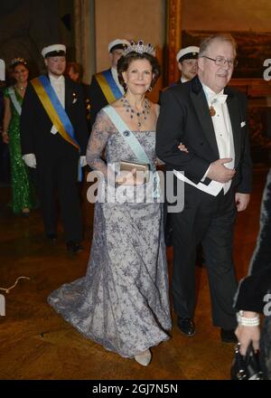 STOCKHOLM 2012-12-10 Queen Silvia and Marcus Storch, Chairman of the Nobel Foundation at the Nobel Banquet in the City Hall in Stockholm Sweden, December 10, 2012. Photo Jessica Gow  / SCANPIX code 10070   Stock Photo