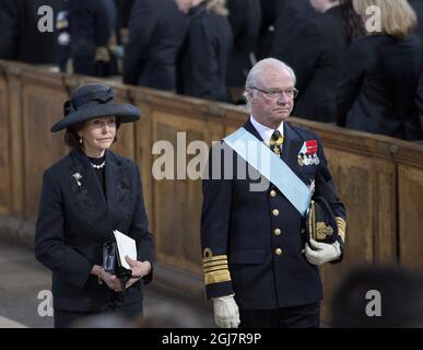 STOCKHOLM 2013-03-16 Queen Silvia and King Carl Gustaf leaving after the funeral of Princess Lilian in the Royal Chapel at the Royal Palace of Stockholm on Saturday March 16, 2013.. Foto: Maja Suslin / SCANPIX / kod 10300 Stock Photo