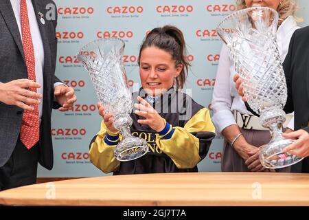 Jockey Amie Waugh Winner of the First race on Ladies Day on Call me Ginger receives her Trophy in, on 9/8/2021. (Photo by Mark Cosgrove/News Images/Sipa USA) Credit: Sipa USA/Alamy Live News Stock Photo