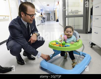 Prince Daniel visits Karolinska University Hospital's transplant surgery clinic at Huddinge hospital on Tuesday April 16, 2013. Here together with Isabel 11 months who received a new liver four months ago.   Stock Photo