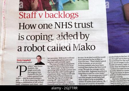 Staff v backlogs 'How one NHS trust is coping, aided by a robot called Mako' Guardian newspaper headline robots article on 2 September 2021 London UK Stock Photo