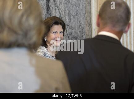 Queen Silvia of Sweden attends a ceremony to unveil a portrait of the Congressional Gold Medal that will be posthumously presented to Raoul Wallenberg at the Treasury Department May 9, 2013 in Washington, DC. Wallenberg, who was Swedish, is credited with saving thousands of Jews in Budapest during the Holocaust.     Stock Photo